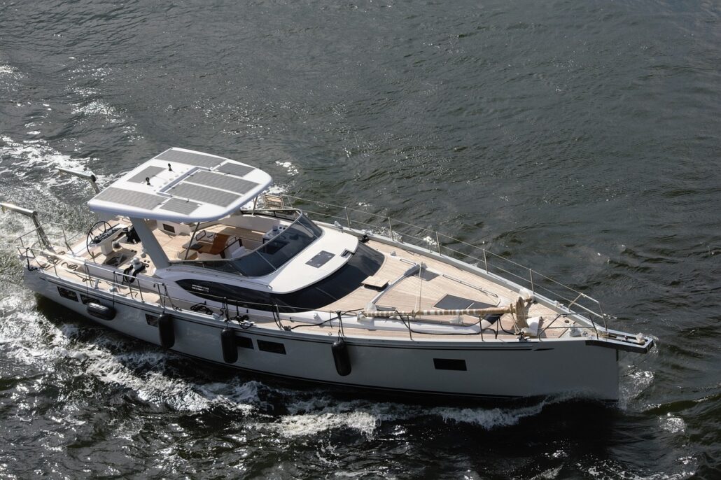 motor yacht cruising, ocean, returning to port-5883604.jpg